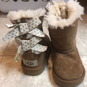 EUC ugg boots with ribbons up the back